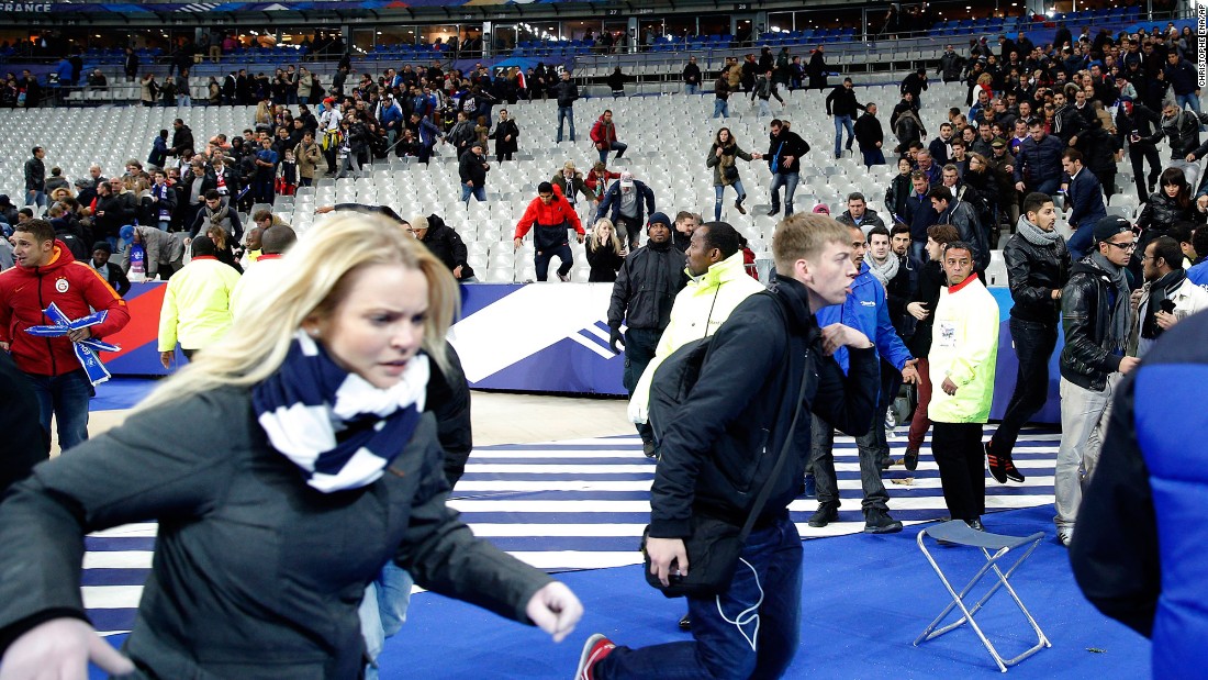 Spectators at the Stade de France in Paris run onto the soccer field after explosions were heard outside the stadium on November 13, 2015. Three teams of gun-wielding ISIS militants &lt;a href=&quot;http://www.cnn.com/2015/11/17/europe/paris-attacks-at-a-glance/&quot; target=&quot;_blank&quot;&gt;hit six locations around the city,&lt;/a&gt; killing at least 129 people and wounding hundreds.