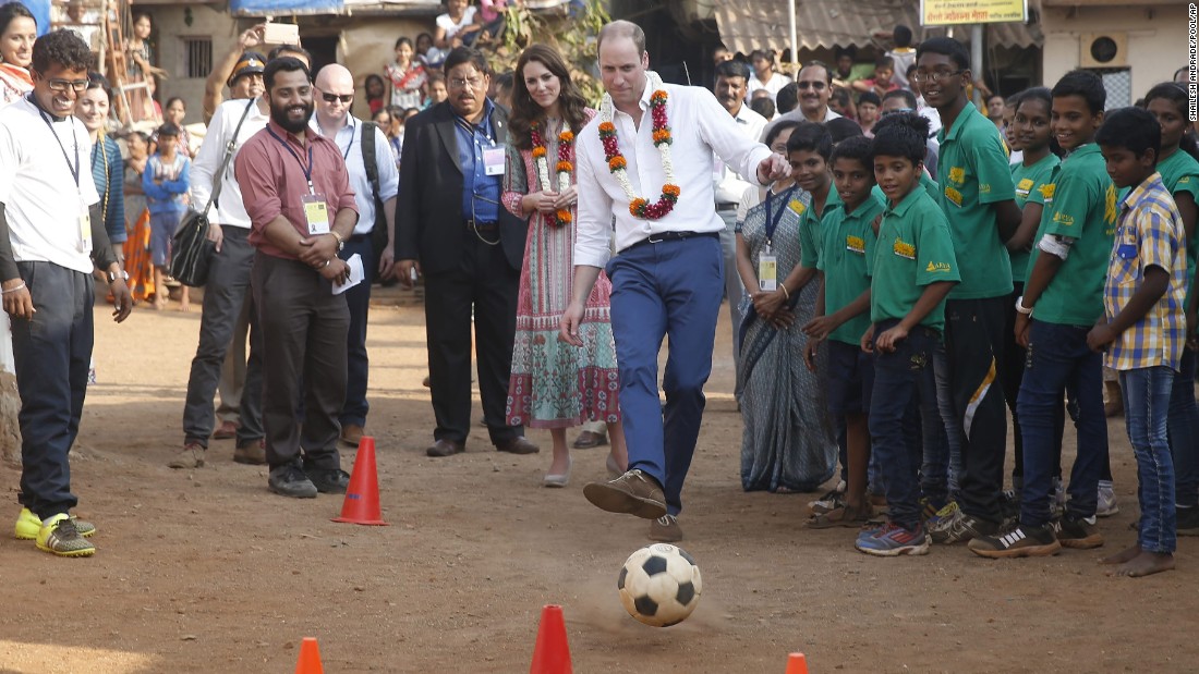 Prince William plays soccer during a visit to a Mumbai slum on April 10.