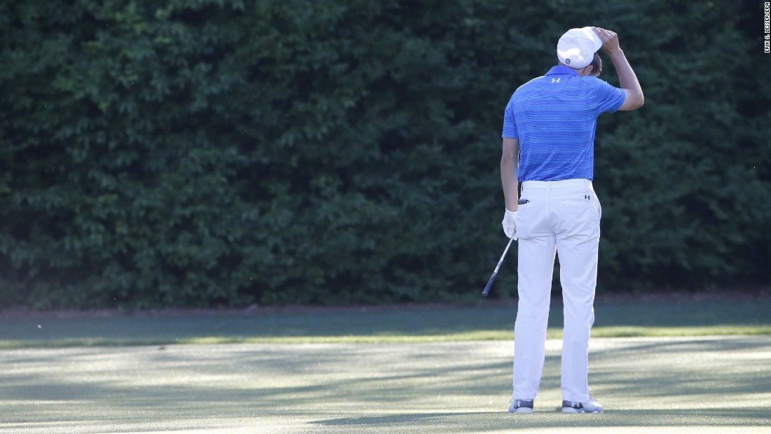 Spieth, the defending champion, was comfortably in first until the 12th hole, when he hit the ball into the water twice and finished with a quadruple-bogey.