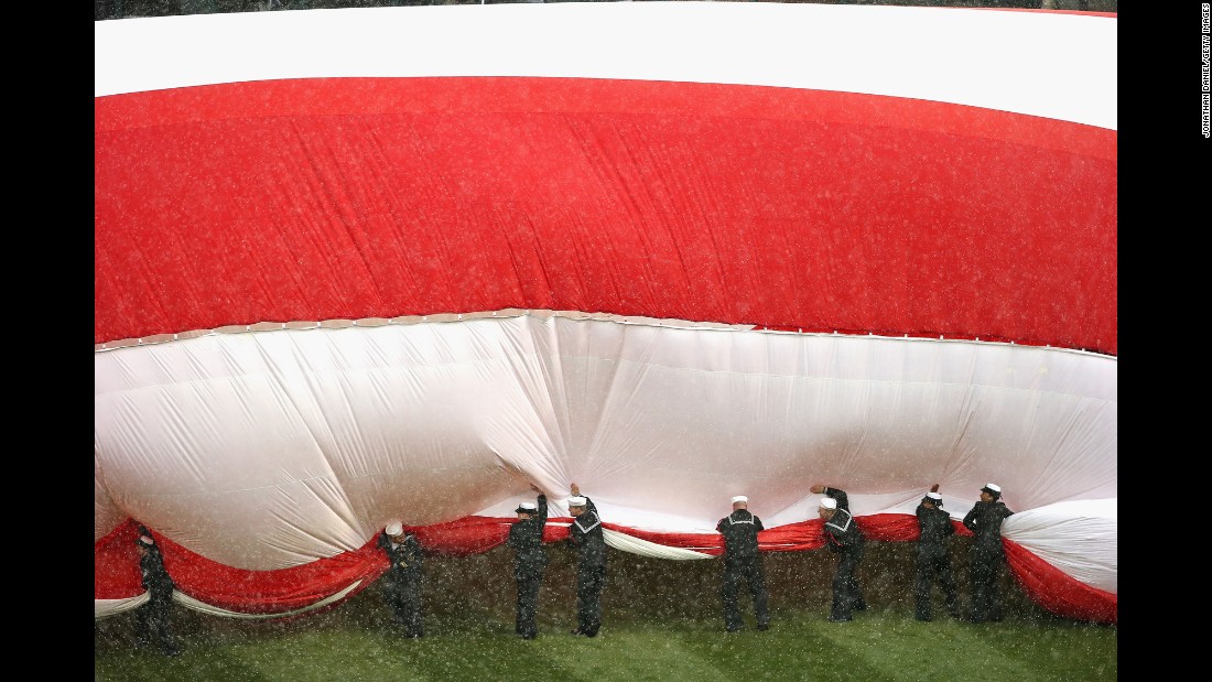 U.S. sailors try to corral a large American flag before the home opener of the Chicago White Sox on Friday, April 8. &lt;a href=&quot;http://www.cnn.com/2016/04/05/sport/gallery/what-a-shot-sports-0405/index.html&quot; target=&quot;_blank&quot;&gt;See 29 amazing sports photos from last week&lt;/a&gt;
