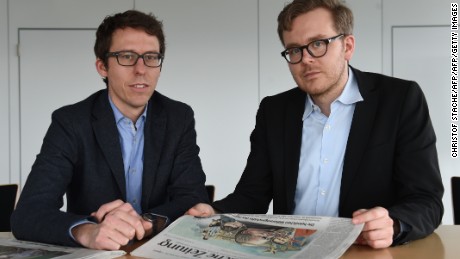 German journalists Bastian Obermayer (R) and Frederik Obermaier (L) co-authors of the socalled &quot;Panama Papers&quot; investigation pose on April 7, 2016 in Munich, southern Germany, at the office of the German daily &quot;Sueddeutsche Zeitung&quot;.
The Panama Papers are a massive leak of 11.5 million documents allegedly exposing the secret offshore dealings of aides to Russian president Vladimir Putin, world leaders and celebrities including Barcelona striker Lionel Messi. The vast stash of records was obtained from an anonymous source by German daily Sueddeutsche Zeitung and shared with media worldwide by the International Consortium of Investigative Journalists (ICIJ).
 / AFP / CHRISTOF STACHE        (Photo credit should read CHRISTOF STACHE/AFP/Getty Images)