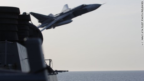 A Russian Sukhoi Su-24 attack aircraft makes a very-low altitude pass by the USS Donald Cook (DDG 75) April 12. Donald Cook, an Arleigh Burke-class guided-missile destroyer, forward deployed to Rota, Spain is conducting a routine patrol in the U.S. 6th Fleet area of operations in support of U.S. national security interests in Europe.
