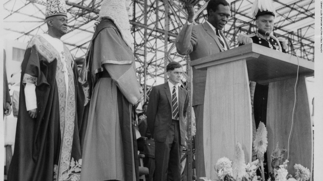 Ugandan Prime Minster Apolo Milton Obote, speaking on stage following the declaration of Ugandan independence, Uganda, September 10th 1962. &lt;br /&gt;&lt;br /&gt;Burgis argues that the exploitation of colonialism continued after independence in many African states, as new ruling elites used natural resources to enhance their wealth and power at the expense of their public. 
