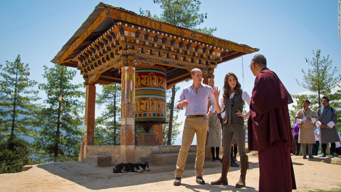 Britain&#39;s Prince William and his wife Catherine, the Duchess of Cambridge, chat with a monk in Thimphu, Bhutan, on Friday, April 15. 