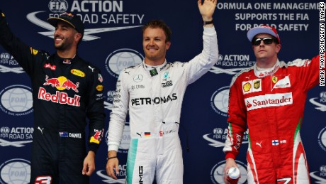 Nico Rosberg takes the pole plaudits flanked by Red Bull&#39;s Daniel Ricciardo and Kimi Raikkonen after qualifying for the Chinese Grand Prix in Shanghai.