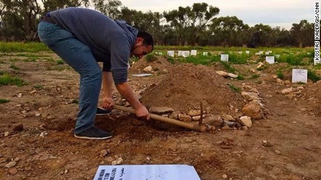 Mustafa Dawa digs graves but also conducts Muslim burial rites for refugees who failed to make the crossing.