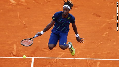 Gael Monfils with a typically acrobatic effort during his final against Nadal in Montel Carlo.
