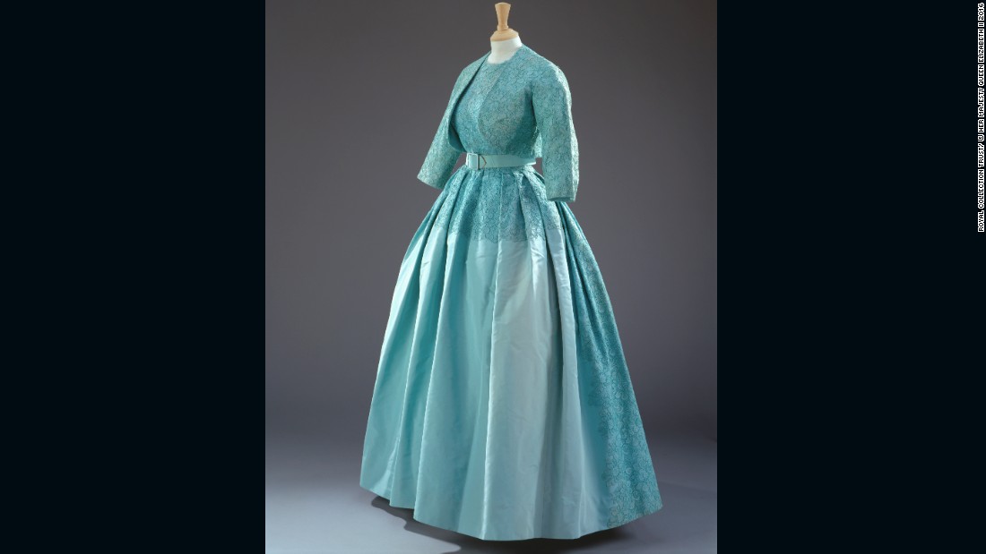 Turquoise dress with a matching bolero jacket of silk taffeta, guipure lace and silk tulle by Norman Hartnell, worn to Princess Margaret&#39;s wedding.