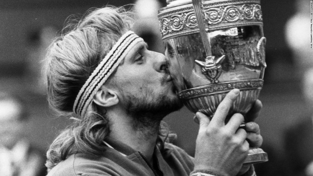 Tennis legend Bjorn Borg of Sweden, seen here kissing the Wimbledon men&#39;s singles trophy after winning it for the fifth time, retired at age 26 in 1983, shocking the tennis community. Borg won 11 Grand Slam titles. He attempted a comeback in 1991, but it was short-lived, because he was unfit and still using a wooden racket.