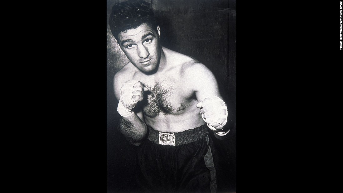 World heavyweight champion Rocky Marciano, seen here in 1955, announced on April 27, 1956, that he was retiring from boxing at age 31. Marciano, who had a perfect 49-0 record with 43 knockouts, said he wanted to spend more time with his family. He died in a plane crash in 1969 at age 45.