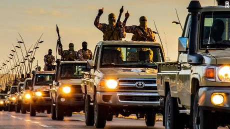 ISIS released still pictures purporting to show massive parade of their militants in the city of Sirte, Libya