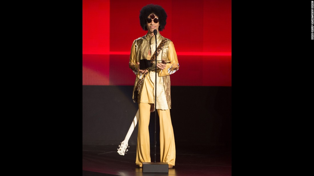 Solid gold -- Prince speaking onstage during the 2015 American Music Awards.&lt;br /&gt;