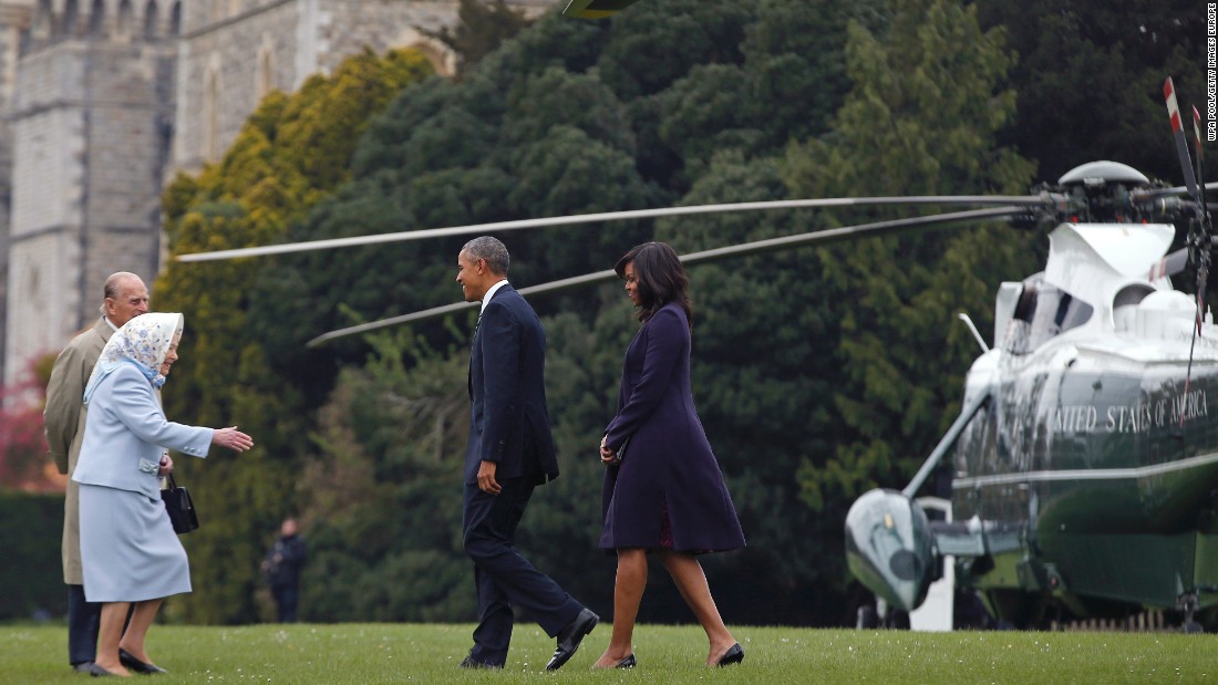 Obama and the first lady are greeted by Queen Elizabeth II and Prince Phillip after landing by helicopter at Windsor Castle for a private lunch on April 22, 2016. 