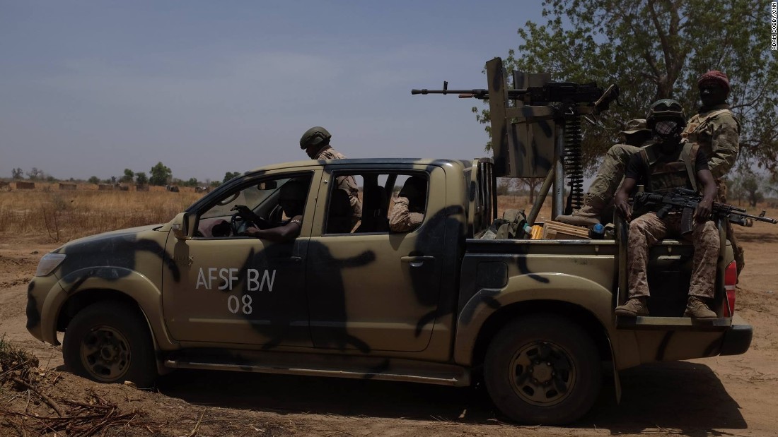 A vehicle full of troops scans the horizon scouting for any indication of insurgent presence. 