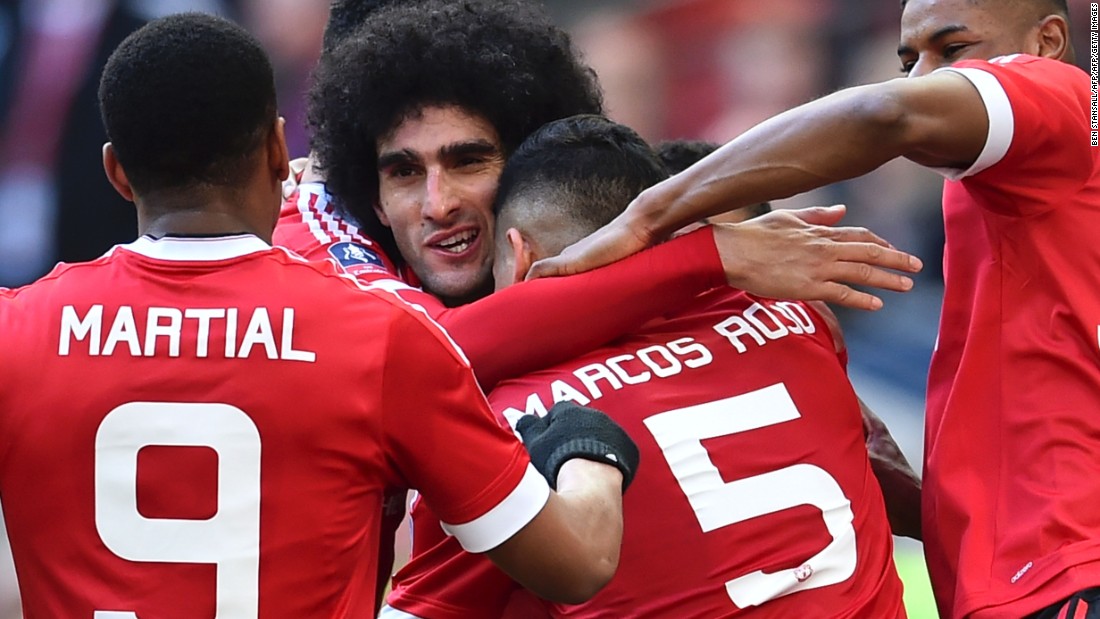 Marouane Fellaini (2L) opened the scoring for United in the first half.