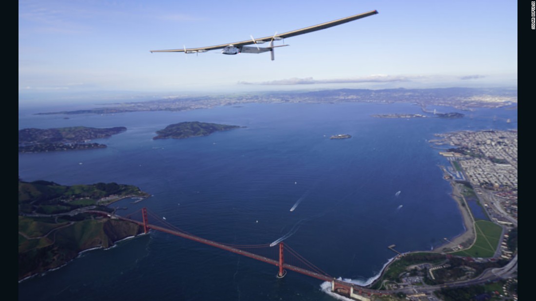 Solar Impulse 2 flies over the Golden Gate Bridge as part of a fly-by of the San Francisco Bay after flying for two and half days from Hawaii.