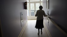 A woman, suffering from Alzheimer&#39;s desease, walks in a corridor on March 18, 2011 in a retirement house in Angervilliers, eastern France.   AFP PHOTO / SEBASTIEN BOZON (Photo credit should read SEBASTIEN BOZON/AFP/Getty Images)