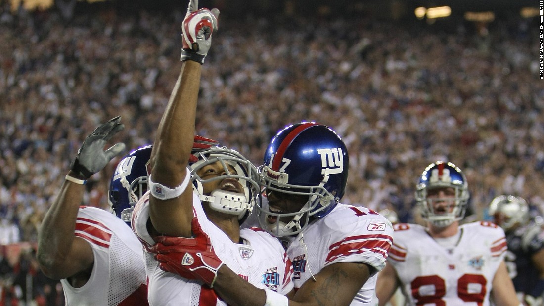 &lt;strong&gt;New England Patriots, Super Bowl XLII: &lt;/strong&gt;New York Giants David Tyree (pointing) celebrates after scoring the second touchdown against the previously undefeated New England Patriots.  The Giants won 17-14 -- perhaps the most shocking upset in Super Bowl history. 