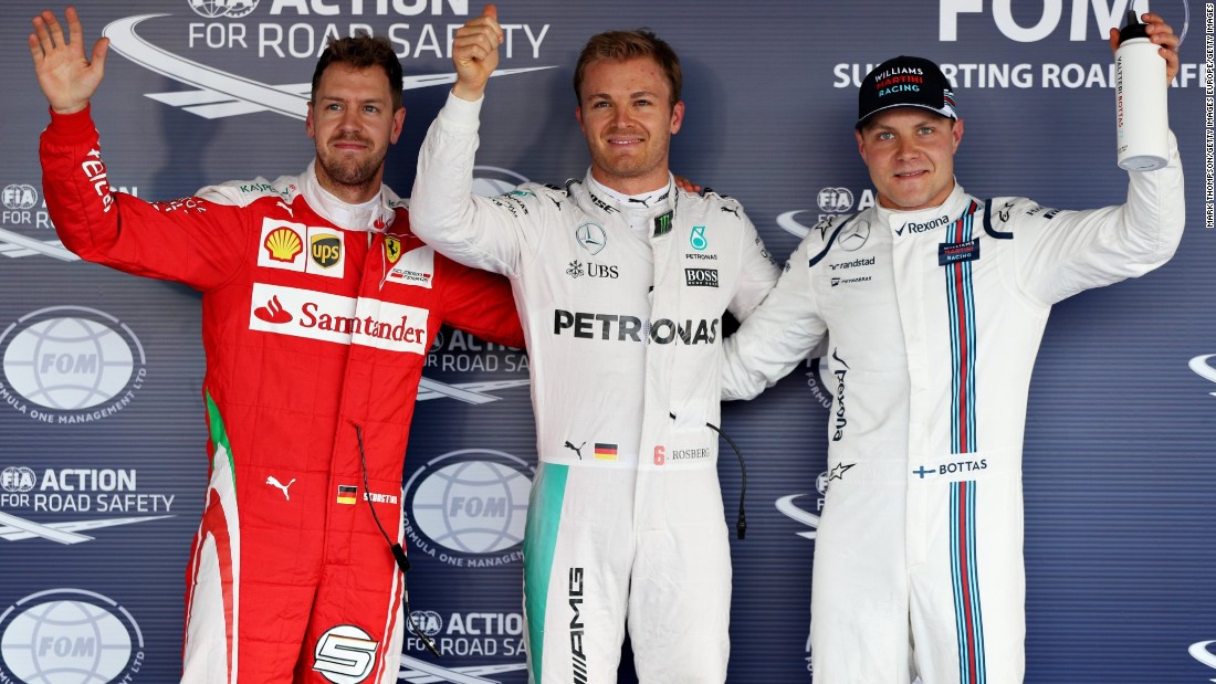 Top three qualifiers, Nico Rosberg of Germany and Mercedes GP, Sebastian Vettel of Germany and Ferrari and Valtteri Bottas of Finland and Williams celebrate in parc ferme during qualifying for the Formula One Grand Prix of Russia at Sochi Autodrom on April 30, 2016 in Sochi, Russia.