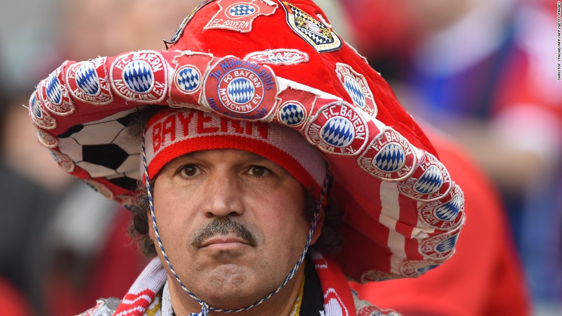 A Bayern Munich supporter waits ahead the German first division Bundesliga football match Bayern Munich vs Borussia Moenchengladbach in Munich.