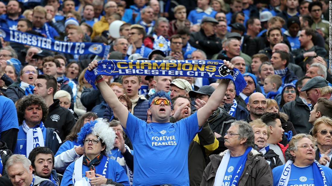 Leicester fans show their support for Ranieri&#39;s team at Old Trafford.