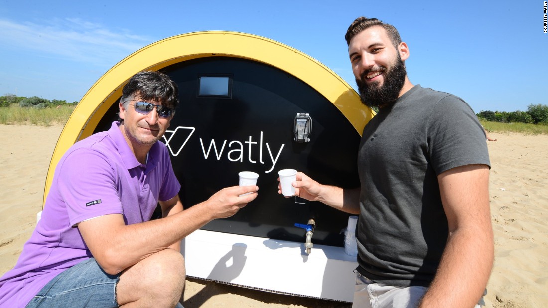 The energy generated through the solar panels is used to produce clean water using a graphene-based filtering process. The company has been testing the technology in rural Ghana and the nest step is to roll out units across Africa. Pictured here are Watly&#39;s Matteo Squizzato and Stefano Buiani testing the water.