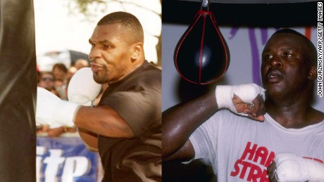 Mike Tyson (L) and Buster Douglas (R)