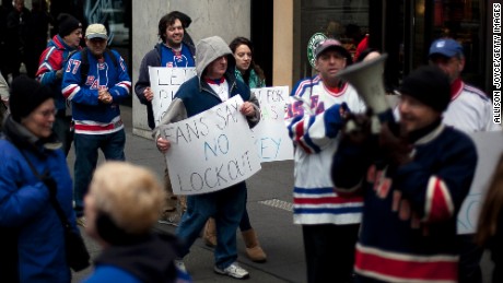 NEW YORK, NY - DECEMBER 1: Hockey fans protest the National Hockey League (NHL) lockout outside the NHL offices in midtown Manhattan December 1, 2012 in New York City. (Photo by Allison Joyce/Getty Images)