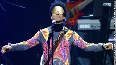 LAS VEGAS, NV - SEPTEMBER 22:  Recording artist Prince performs with singer Mary J. Blige onstage during the 2012 iHeartRadio Music Festival at the MGM Grand Garden Arena on September 22, 2012 in Las Vegas, Nevada.  (Photo by Isaac Brekken/Getty Images for Clear Channel)