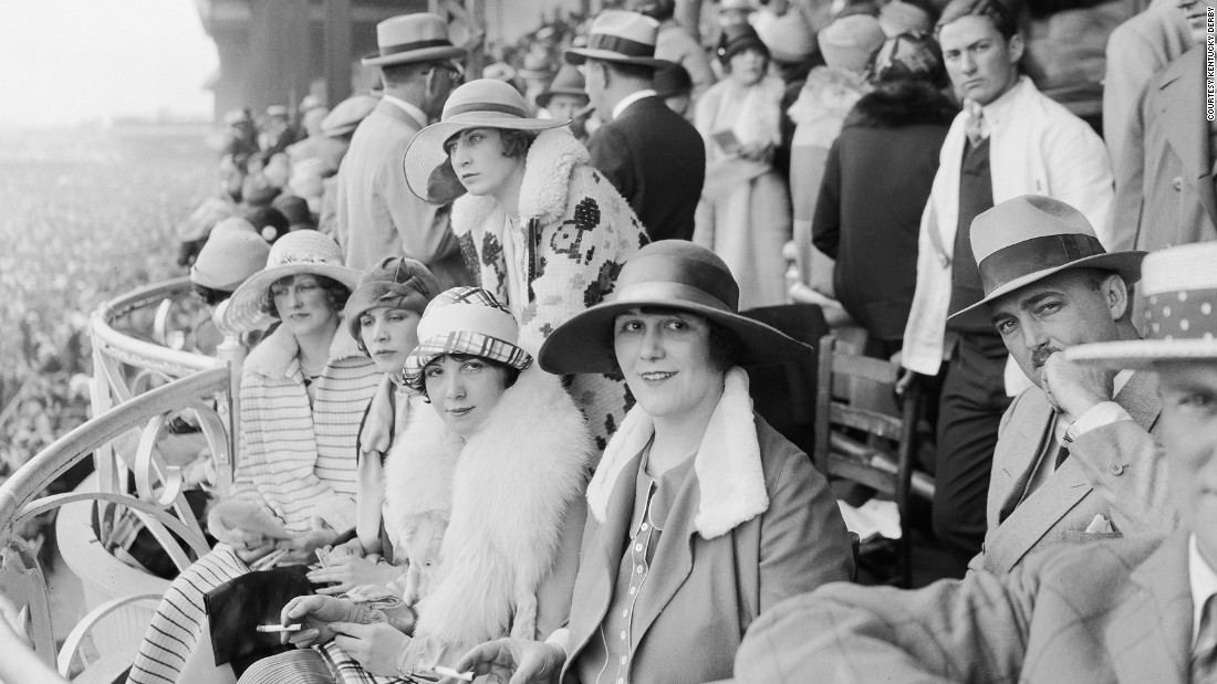 The Derby first launched in 1875, and up until the turn of the 20th century women could be seen wearing hats, gloves, and long dresses down to their ankles.&lt;br /&gt;&quot;At any social outing in America at that time, you would have worn a hat and gloves -- and the Kentucky Derby was no different,&quot; said Chris Goodlet, Curator of Collections at the &lt;a href=&quot;http://www.derbymuseum.org/&quot; target=&quot;_blank&quot;&gt;Kentucky Derby Museum.&lt;/a&gt;&lt;br /&gt;&quot;Many women would have worn silk because of the warm weather, and be carrying a parasol.&quot;&lt;br /&gt;This image features race-goers in 1926.