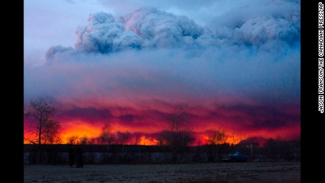 A wildfire moves towards the town of Anzac from Fort McMurray, Alberta., on Wednesday May 4, 2016.