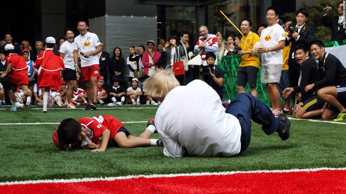 London Mayor Boris Johnson &lt;a href=&quot;http://www.cnn.com/2015/10/15/sport/london-mayor-boris-johnson-rugby/index.html&quot; target=&quot;_blank&quot;&gt;knocks over 10-year-old Toki Sekiguchi&lt;/a&gt; during a touch rugby game in Tokyo on October 15, 2015. &quot;I accidentally flattened a 10-year-old on TV unfortunately,&quot; Johnson said in a speech to British and American businessmen. &quot;But he bounced back, he put it behind him. The smile returned rapidly to his face.&quot;