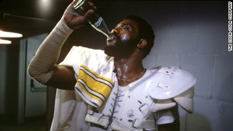 1979- Mean Joe Greene
First debuting in 1979, &quot;Mean&quot; Joe Greene has been consistently voted as one of the greatest Super Bowl ads of all time.  The ad showcased one of the most formidable defensemen in NFL history and softened his public image after he shares a touching Coca-Cola moment with a young fan. 
