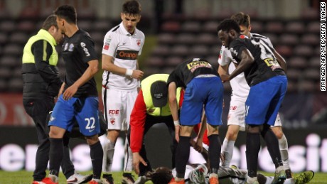 Cameroonian international soccer player Patrick Ekeng lies on pitch after he collapsed during the match between Dinamo Bucharest and Viitorul Constanta in the Romanian capital of Bucharest on Friday. 
