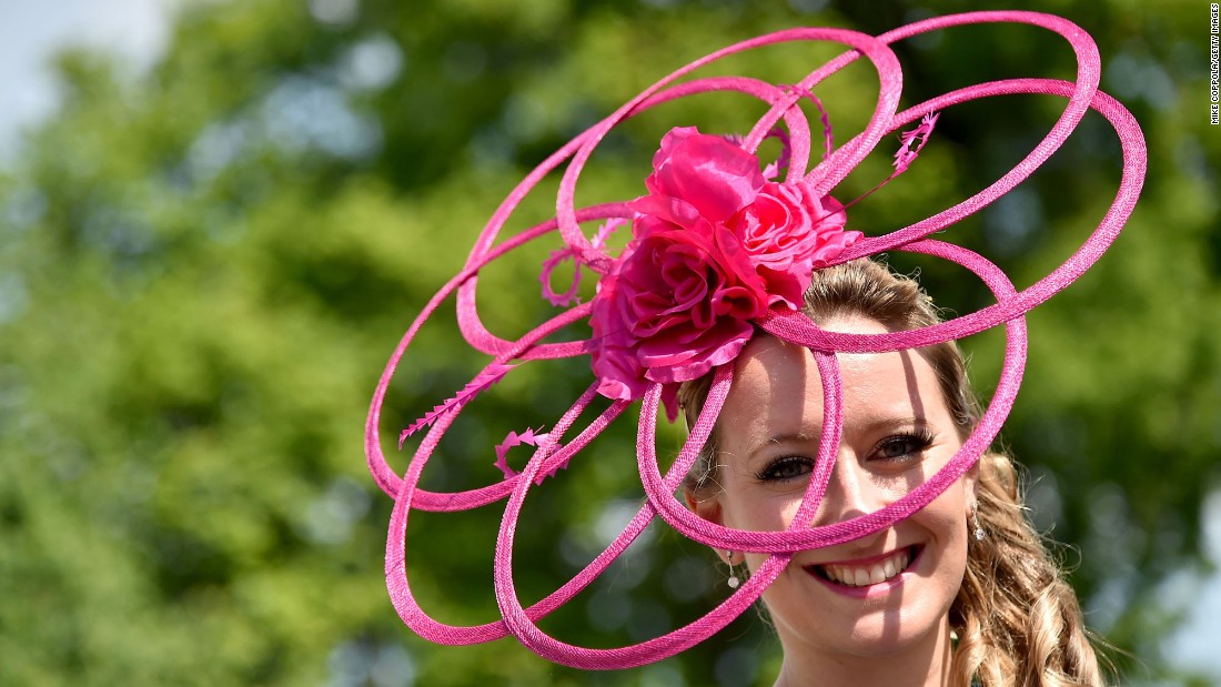 A festive attendee poses during the 142nd Kentucky Derby at Churchill Downs on Saturday, May 7, in Louisville.  