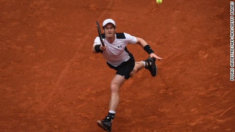 Andy Murray stretches to return a ball against Rafael Nadal.
