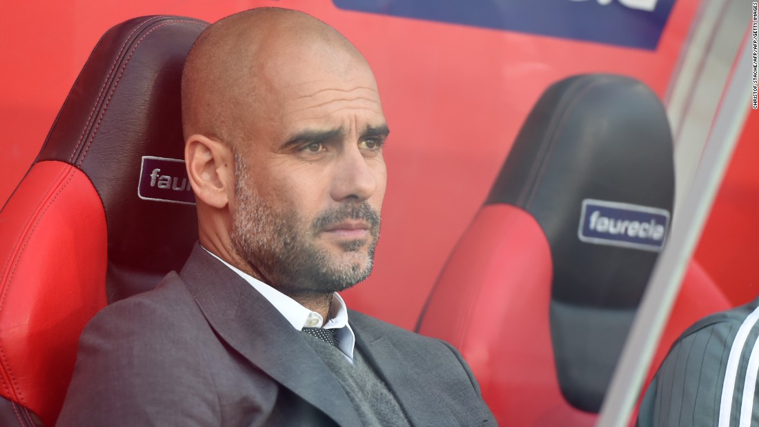 Bayern manager Pep Guardiola watches on from the sidelines.
