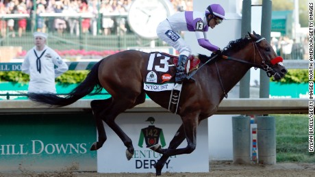 LOUISVILLE, KY - MAY 07:  Nyquist #13, ridden by Mario Gutierrez, crosses the finish line to win the 142nd running of the Kentucky Derby at Churchill Downs on May 07, 2016 in Louisville, Kentucky.  (Photo by Dylan Buell/Getty Images)