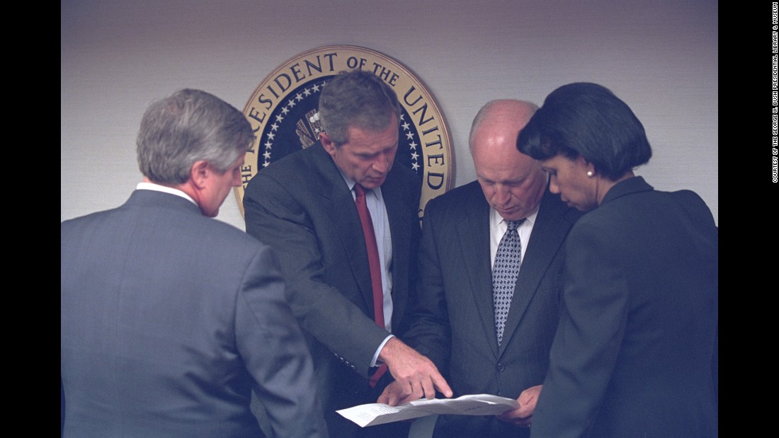 Bush talks with Card, Vice President Dick Cheney and National Security Advisor Condoleezza Rice in Washington.