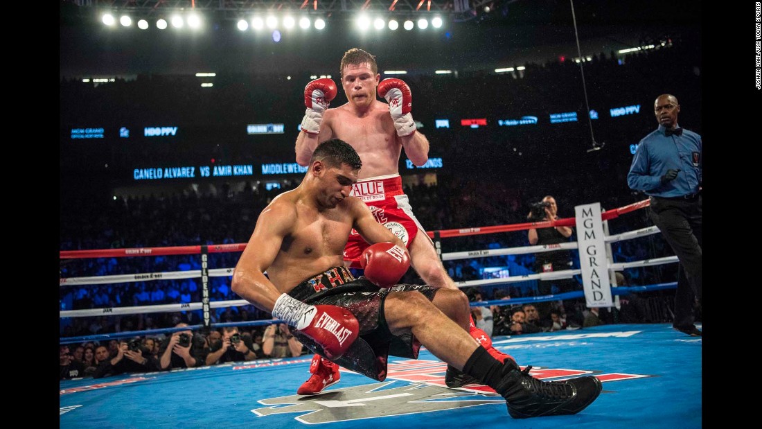 Canelo Alvarez knocks out Amir Khan during the sixth round of their middleweight title fight in Las Vegas on Saturday, May 7.