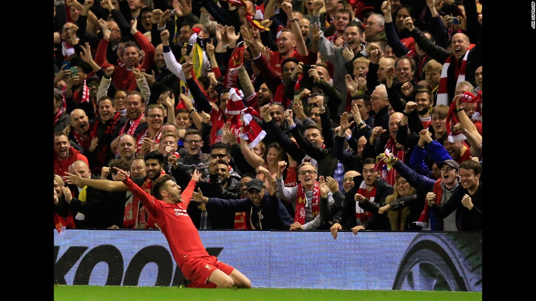 Liverpool&#39;s Adam Lallana celebrates in front of his home fans after scoring a goal during the Europa League semifinal against Villarreal on Thursday, May 5. The English club won 3-0 to advance to the final against Sevilla. &lt;a href=&quot;http://edition.cnn.com/2016/05/05/football/liverpool-europa-league-villarreal-klopp/&quot;&gt;READ MORE: Liverpool overpowers Villarreal&lt;/a&gt;