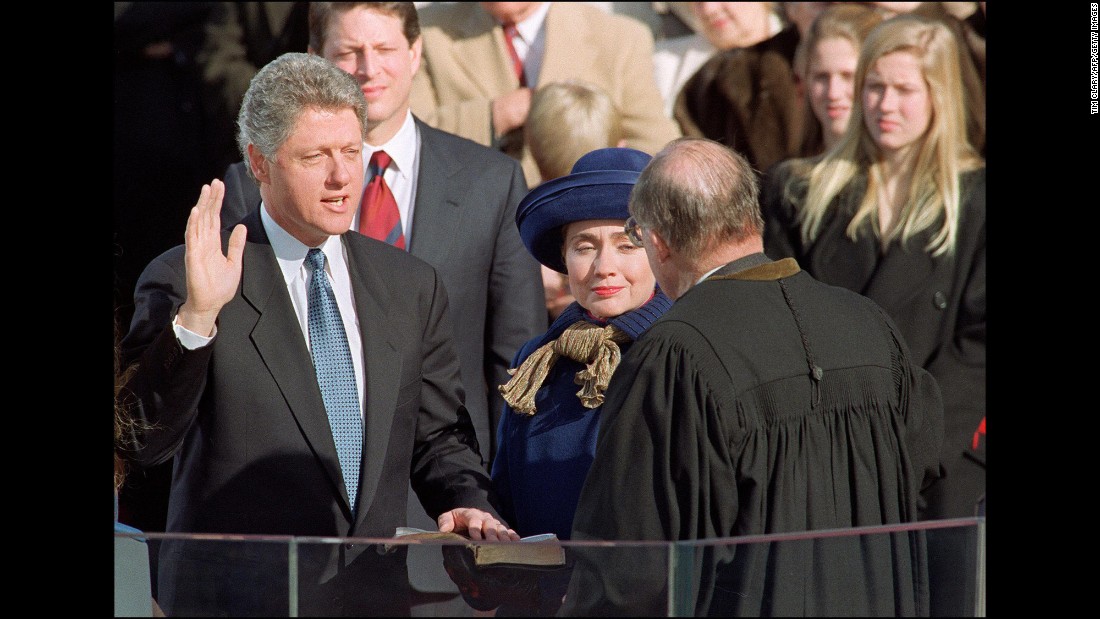 Clinton accompanies her husband as he takes the oath of office in January 1993.