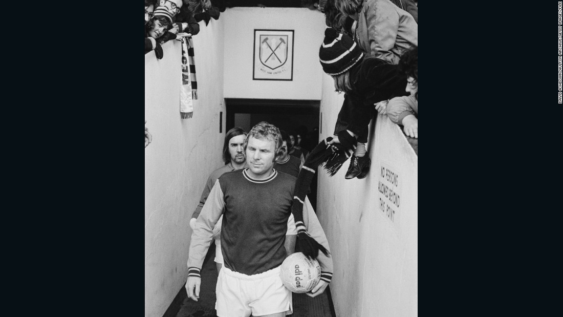 Moore leads the West Ham reserves onto the pitch before his final match at the Boleyn Ground on March 9, 1974 before his transfer to London rival Fulham. 