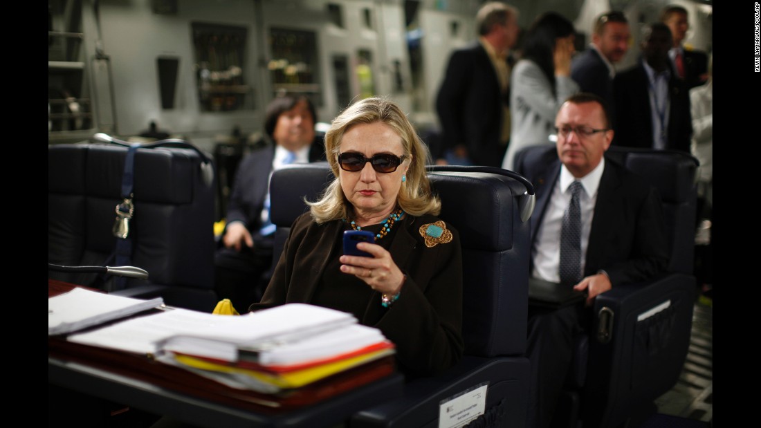 Clinton checks her Blackberry inside a military plane after leaving Malta in October 2011. In 2015, The New York Times reported that Clinton exclusively used a personal email account during her time as secretary of state. The account, fed through its own server, raises security and preservation concerns. Clinton later said she used a private domain out of &quot;convenience,&quot; but admits in retrospect &quot;it would have been better&quot; to use multiple emails.