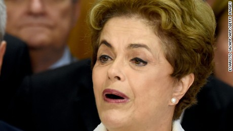Brazil&#39;s suspended President Dilma Rousseff makes a statement at the Planalto Palace in Brasilia on May 12, 2016. Rousseff said Thursday that democracy and the constitution are at stake after she was forced to face an impeachment trial in the Senate and cede power to vice president Michel Temer.
