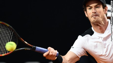 Andy Murray returns the ball to Novak Djokovic during their final Sunday. 