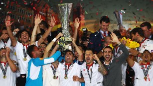 Captain Jose Antonio Reyes (C) of Sevilla is seen lifting the Europa League trophy in celebration on May 18, 2016 in Basel, Switzerland.