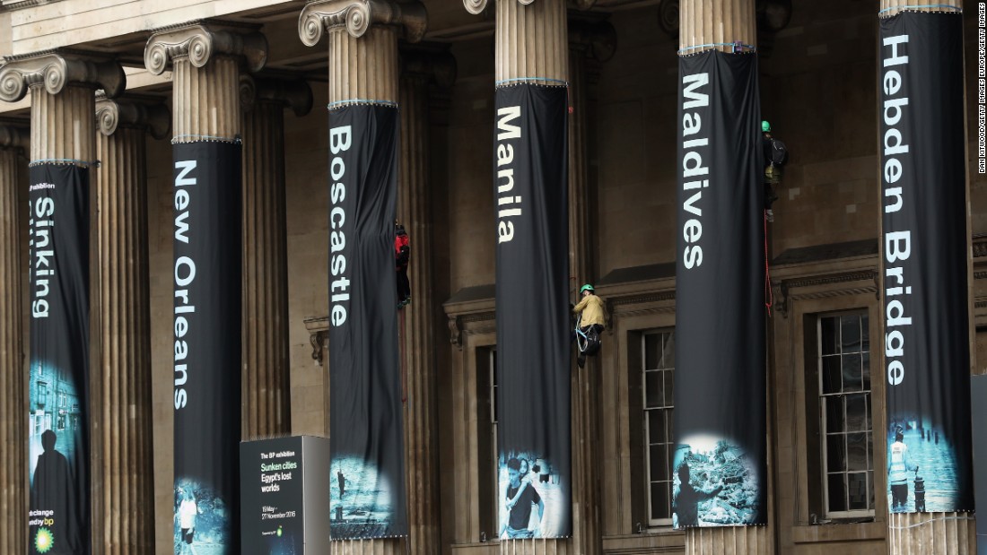 Greenpeace activists hang banners on the front of the British Museum on May 19, 2016 in London, England. 