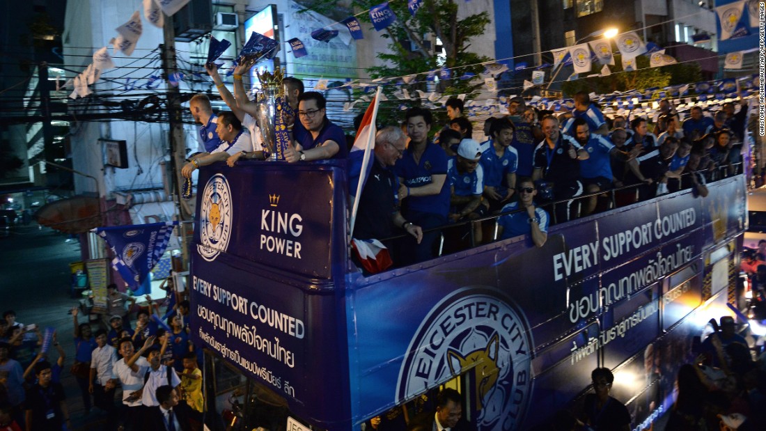 The Leicester victory parade continues as dusk begins to fall.