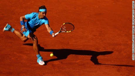 PARIS, FRANCE - JUNE 03:  Rafael Nadal of Spain plays a forehand in his Men&#39;s quarter final match against Novak Djokovic of Serbia on day eleven of the 2015 French Open at Roland Garros on June 3, 2015 in Paris, France.  (Photo by Clive Brunskill/Getty Images)